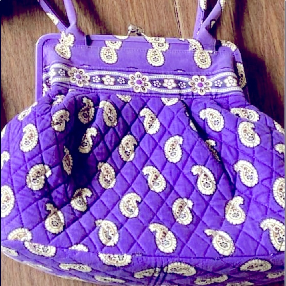 Purple paisley purse with silver ball clasp. Excellent condition.